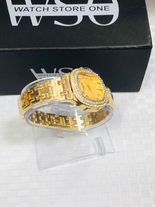 Petek philip female watch golden